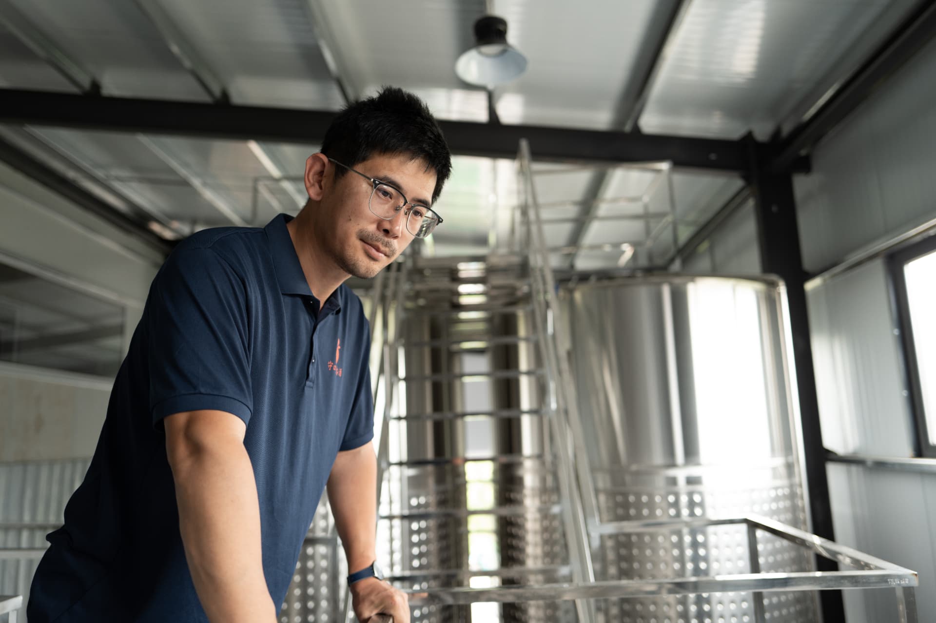 Winemaker inside Shoukoubao winery